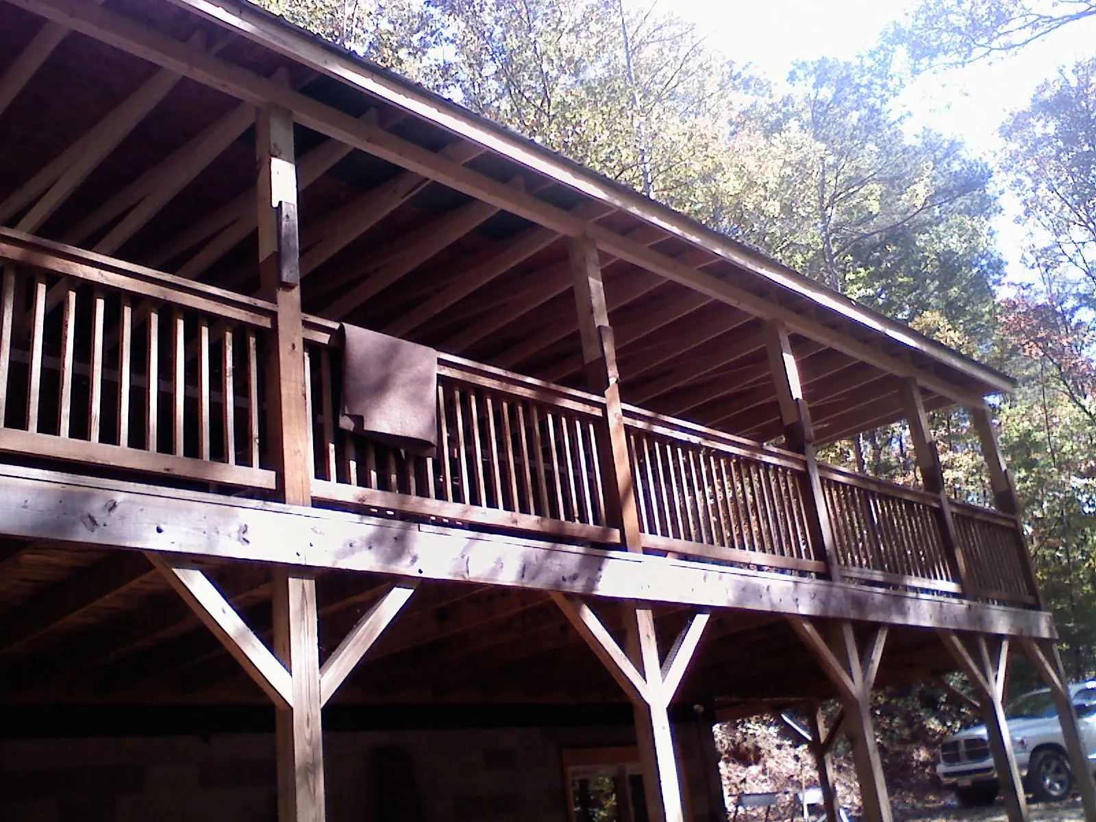 Timber framing under a new elevated porch and deck — Roof Leak Repair in Plainwell by Roofing Brothers